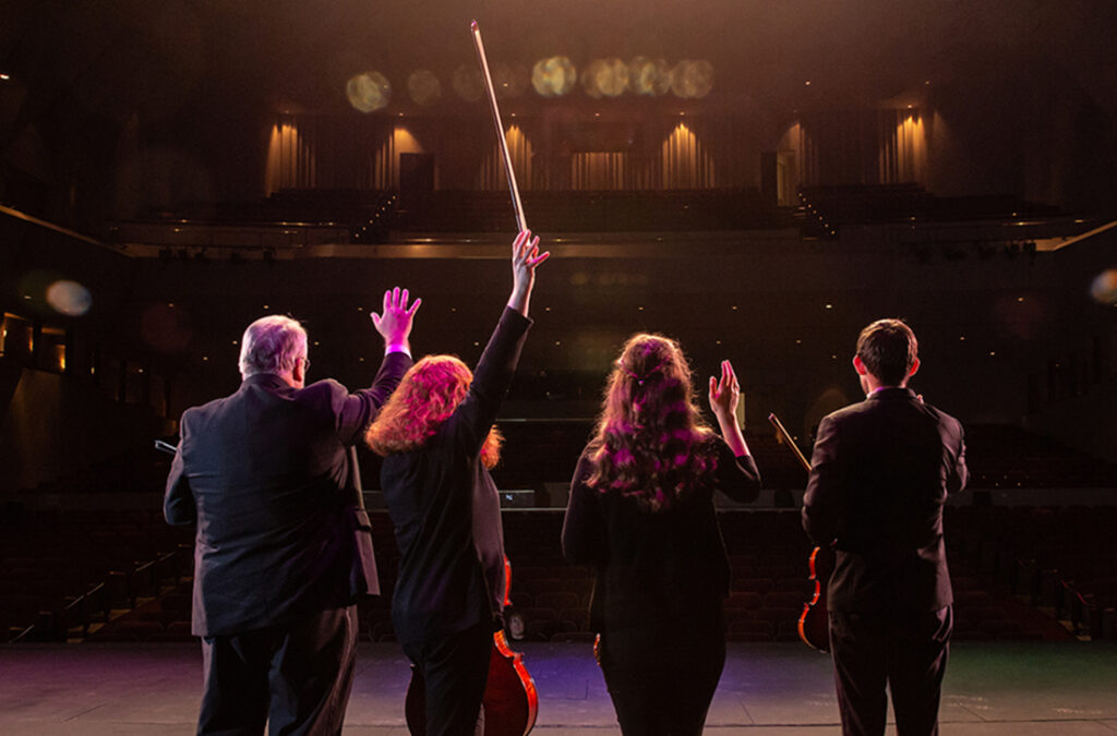 Returning to the stage, Signature Quartet members Corbin Bodley, violin; Jeffrey A. Smith, viola; Erica D. Parker, cello; and Sarah Thomas, violin, present "An Oklahoma Journey," on Saturday, Nov. 6. The chamber music concert will have an in-person audience and feature the Signature Chorale.